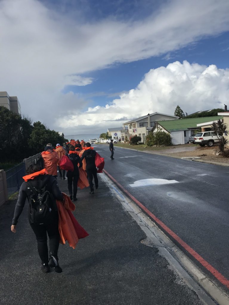 Walking to the boat with our shark diving in Cape Town South Africa gear