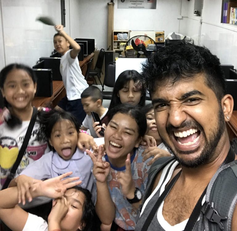 Nishil and Kids make funny face during donation project