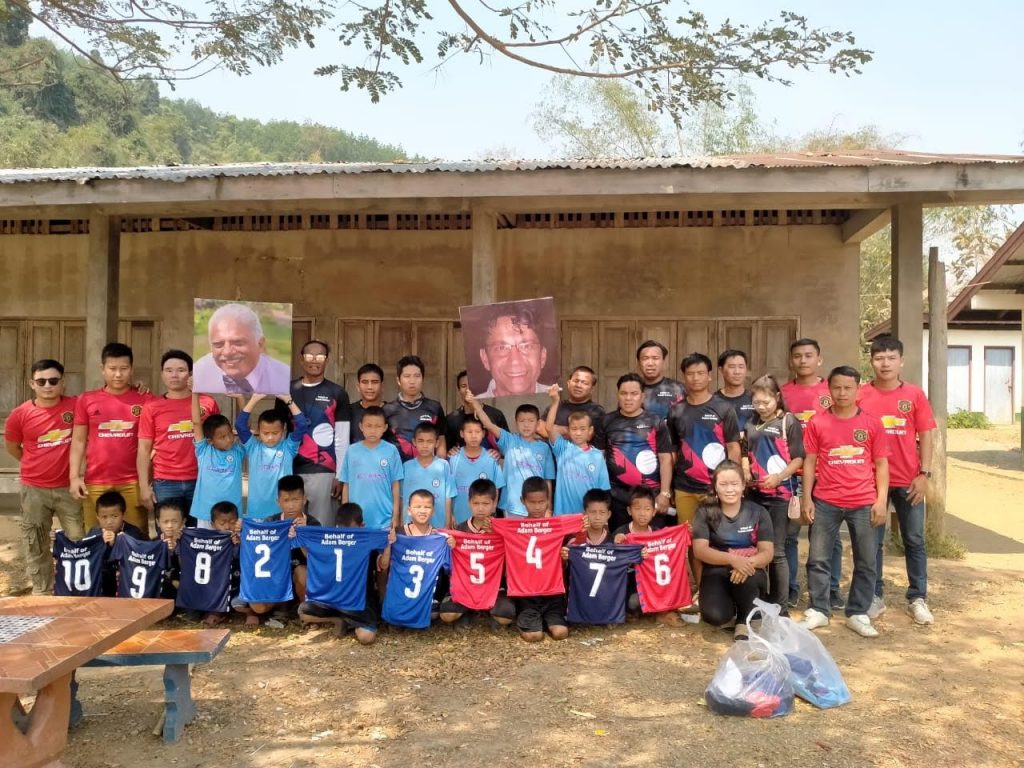 A school receives their new equipment and tools as part of a charity project in Laos
