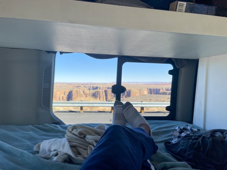 Feet by the window looking over canyon
